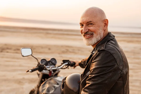 Mature Bold Man Leather Jacket Smiling While Posing Motorbike Outdoors — Foto Stock