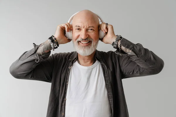 Bald Bearded European Man Listening Music Headphones Isolated White Background — Foto Stock
