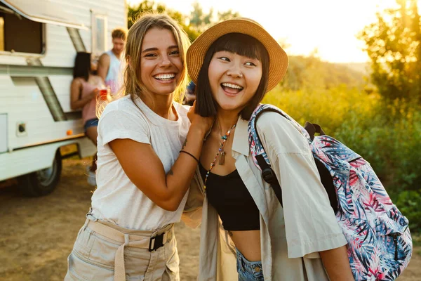 Multiracial Women Hugging Laughing Picnic Friends Outdoors — Foto Stock