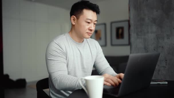 Asian Happy Man Working Laptop Home — Stock Video
