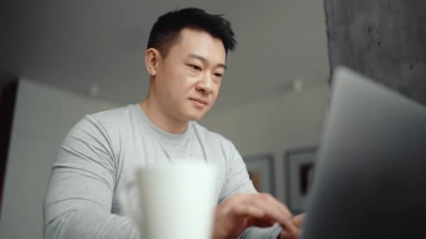 Asian Handsome Man Working Laptop Home — Vídeo de Stock