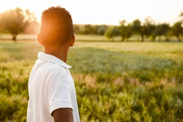 Black Boy Wearing White Shirt Looking Sunset While Standing Summer — Stock Fotó