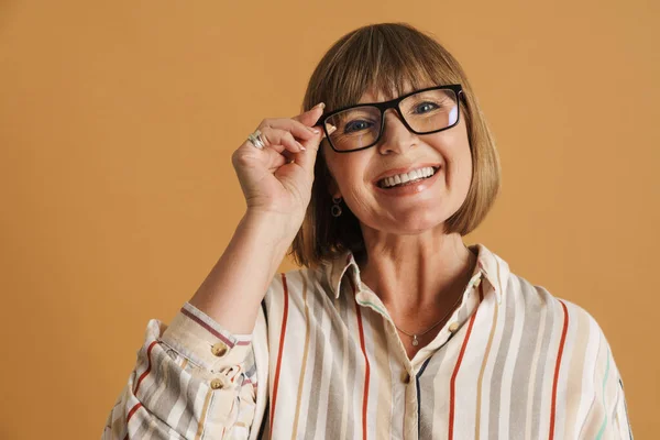 Senior Woman Wearing Eyeglasses Smiling Looking Camera Isolated Beige Wall — Photo