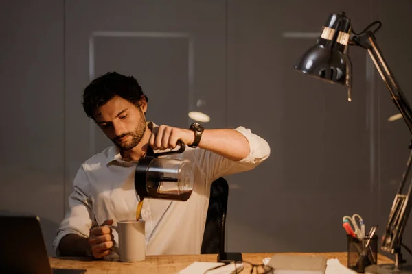 White Bearded Man Drinking Coffee While Working Laptop Evening Office — Fotografia de Stock
