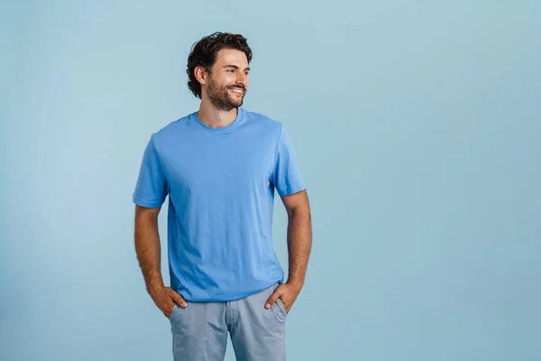 Young Brunette Man Bristle Smiling Looking Aside Isolated Blue Background — Foto de Stock