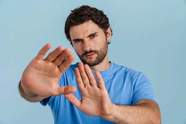 Young Brunette Man Bristle Showing Stop Gesture Camera Isolated Blue — Fotografia de Stock