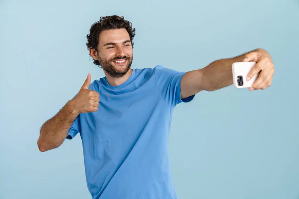 Young Brunette Man Gesturing While Taking Selfie Mobile Phone Isolated — Foto de Stock