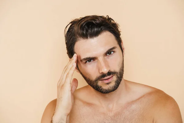 Young Half Naked Man Rubbing His Temple Looking Camera Isolated —  Fotos de Stock