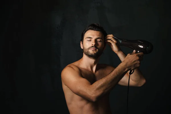 Young Half Naked Man Posing Camera While Using Hair Dryer —  Fotos de Stock