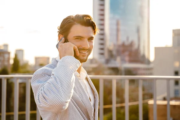 Young Man Talking Mobile Phone While Standing Cafe Outdoors — Stock Photo, Image