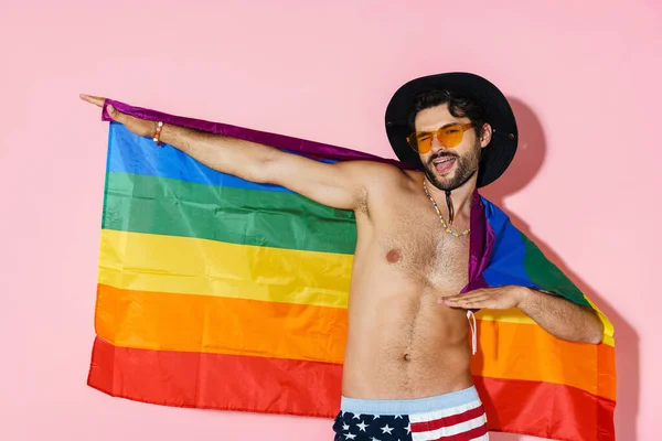 Young Shirtless Man Wearing Shorts Smiling While Posing Rainbow Flag — ストック写真