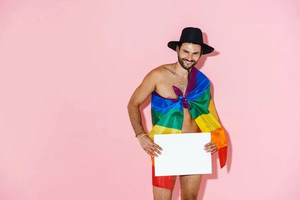 Young Shirtless Man Rainbow Flag Smiling While Showing Placard Isolated — ストック写真