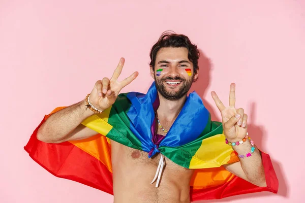 Young Shirtless Man Wearing Rainbow Flag Laughing Gesturing Camera Isolated — ストック写真