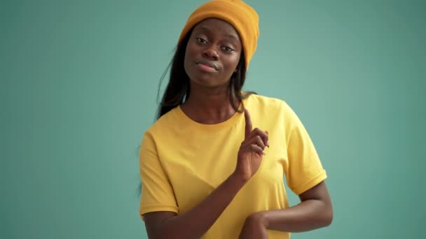 Pretty African Woman Dancing Turquoise Studio — Vídeos de Stock