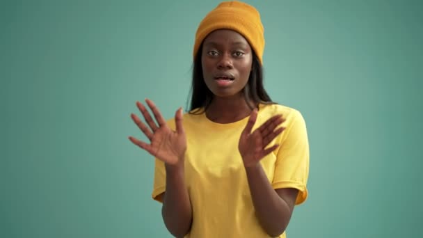Cheerful African Woman Dancing Singing Turquoise Studio — Vídeos de Stock
