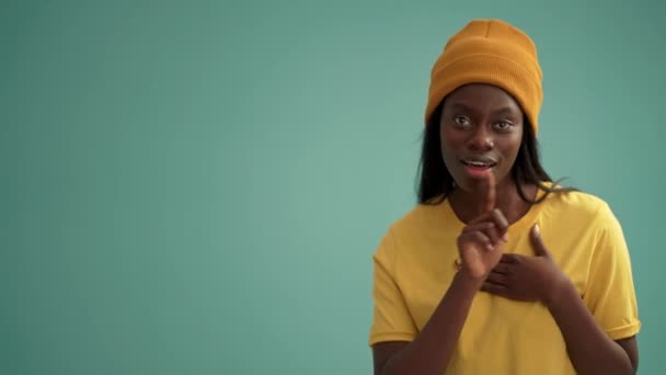 Rejoicing African Woman Fooling Turquoise Studio — Vídeos de Stock