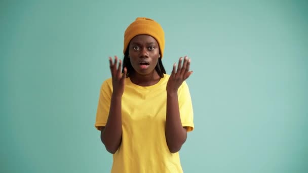 Sad African Woman Showing Stop Gesture Camera Turquoise Studio — Video