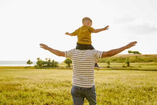 Young White Father Son Gesturing Playing Together Outdoors — стоковое фото