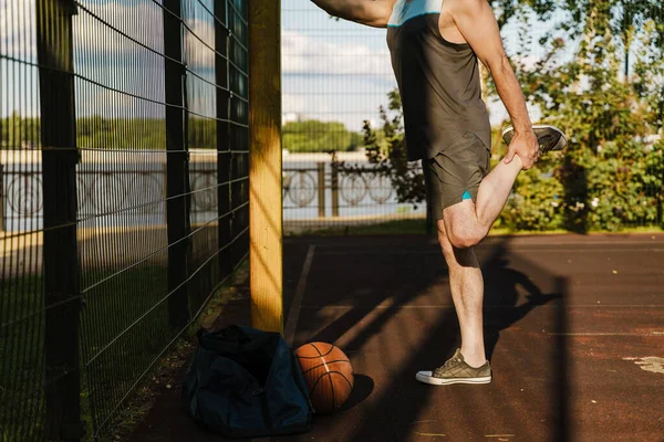 White Senior Man Stretching His Leg While Working Out Playground — Foto Stock