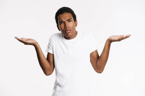 Jonge Zwarte Man Gekleed Shirt Fronsen Terwijl Het Houden Van — Stockfoto