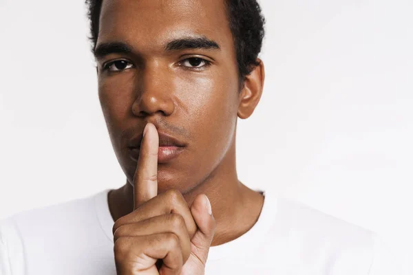 Young Black Man Showing Silence Gesture Looking Camera Isolated White —  Fotos de Stock