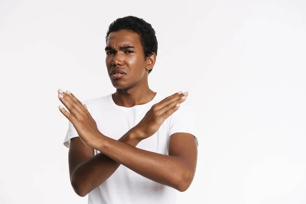 Young Black Man Frowning While Making Stop Gesture Isolated White — Stockfoto