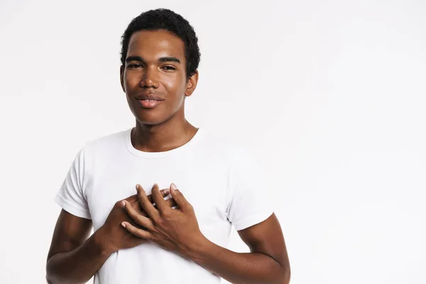 Young Black Man Shirt Smiling While Holding Hands His Chest — Stockfoto