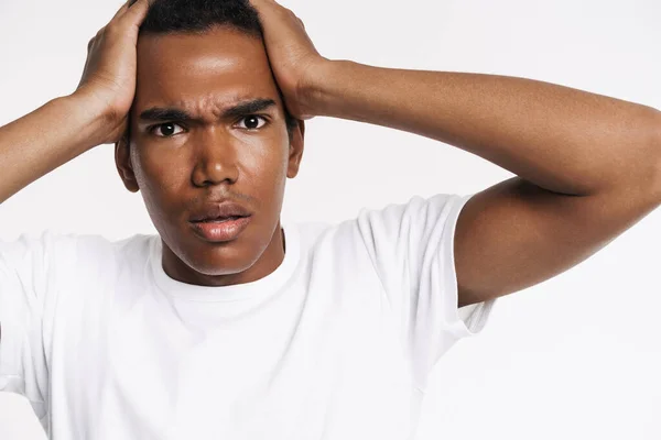 Young Black Man Shirt Frowning While Holding His Head Isolated — Stockfoto