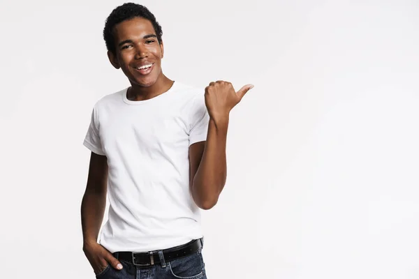 Young Black Man Dressed Shirt Pointing Finger Aside Smiling Isolated — Stockfoto