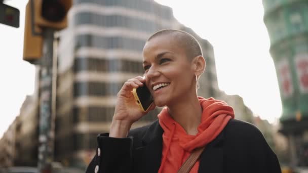 Positive Bald Woman Talking Mobile Street — Stock video