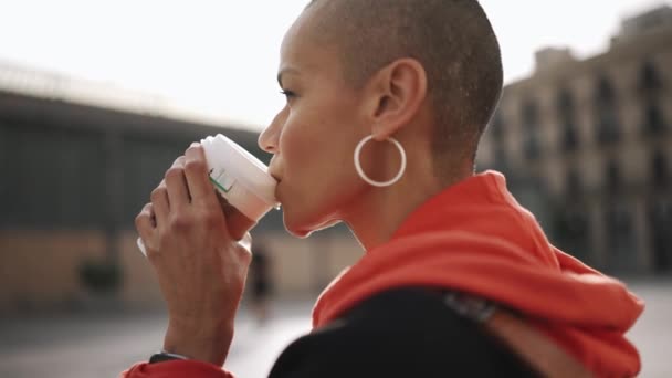 Pretty Bald Woman Drinking Coffee Bench — Wideo stockowe