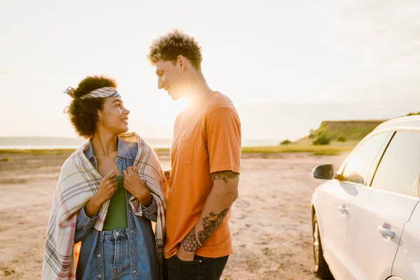 Young Multiracial Couple Smiling Looking Each Other Car Trip — Stock Fotó