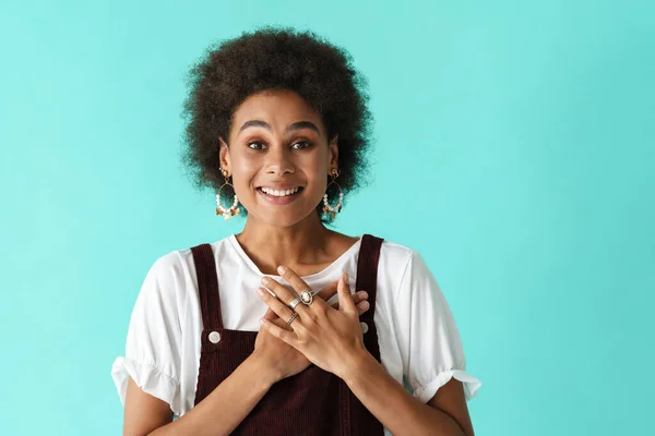 Black Young Woman Earrings Smiling While Holding Hands Her Chest — Stock fotografie