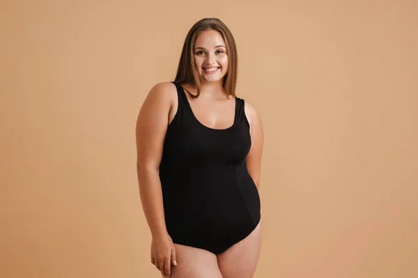 Young Woman Wearing Swimsuit Smiling Looking Camera Isolated Beige Background — 스톡 사진