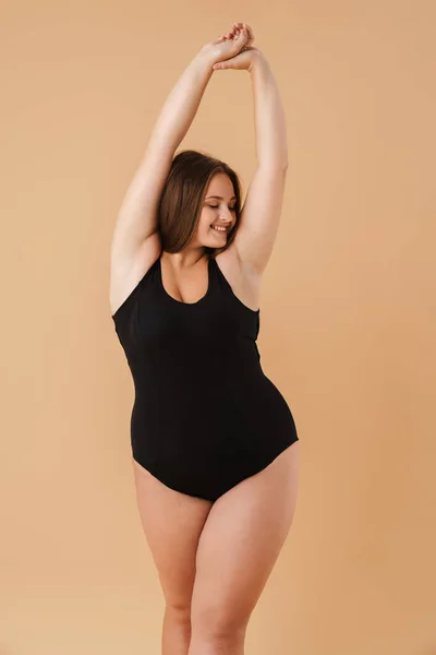 Young Woman Wearing Swimsuit Smiling While Posing Camera Isolated Beige — 스톡 사진