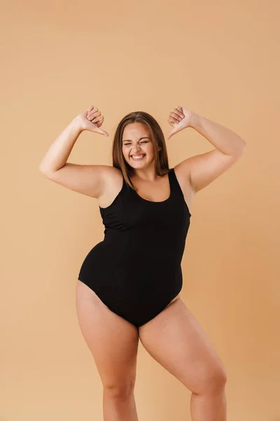 Young Woman Wearing Swimsuit Smiling While Pointing Fingers Herself Isolated — 스톡 사진