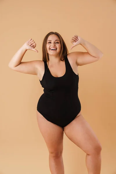 Young Woman Wearing Swimsuit Smiling Pointing Fingers Herself Isolated Beige — 스톡 사진