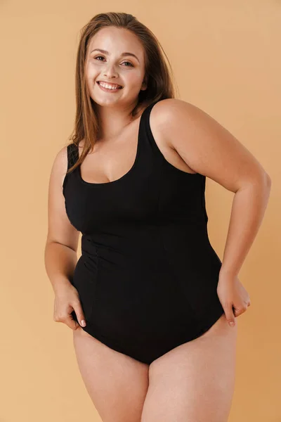 Young Woman Wearing Swimsuit Smiling Looking Camera Isolated Beige Background — Φωτογραφία Αρχείου