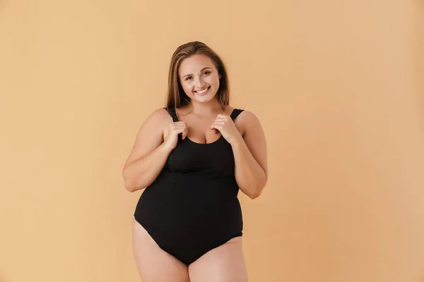 Young Woman Wearing Swimsuit Smiling Looking Camera Isolated Beige Wall — 스톡 사진