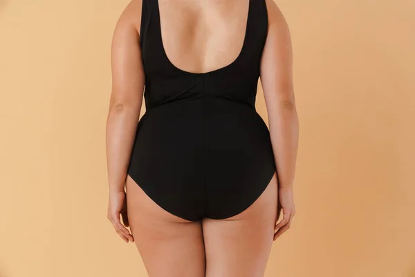 Young White Woman Wearing Swimsuit Posing Camera Isolated Beige Background — 스톡 사진