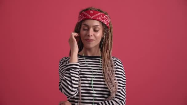 Cheerful Hippie Woman Dancing Headphones Pink Studio — Stock Video