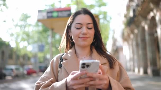 Positive Brunette Woman Texting Phone Walking Street — Stock Video