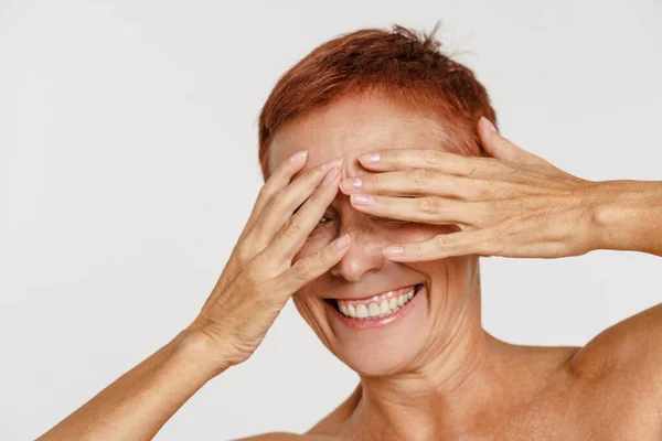 Senior Shirtless Woman Short Hair Smiling While Covering Her Eyes — Stock Photo, Image