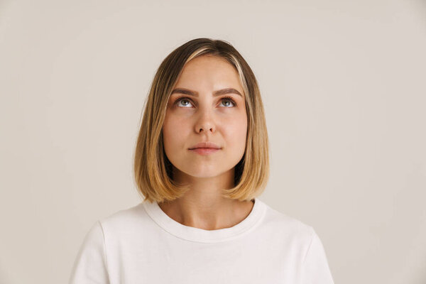Young Blonde Woman Dressed Shirt Posing While Looking Upward Isolated Stock Picture
