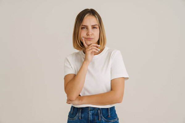 Young Puzzled Woman Wearing Shirt Looking Camera Isolated White Background Royalty Free Stock Photos