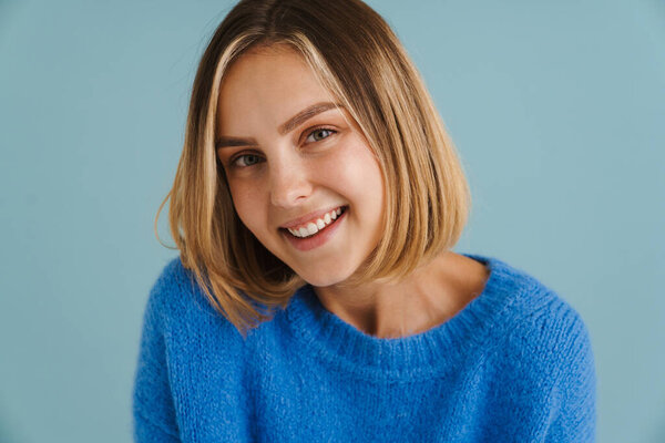 Young Blonde Woman Wearing Sweater Smiling Looking Camera Isolated Blue Stock Image