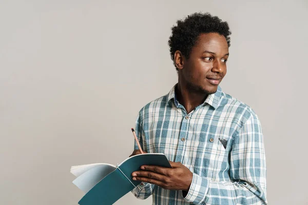 Black Unshaven Man Plaid Shirt Writing Exercise Book Isolated White — Stock Photo, Image