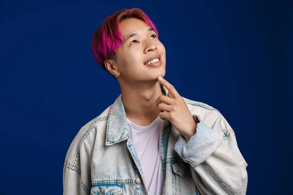 Asian Boy Pink Hair Smiling Looking Upward Isolated Blue Background — Stock Photo, Image