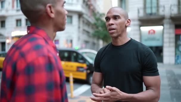 Two Serious Bald African Brothers Talking Street Outdoors — Stock Video