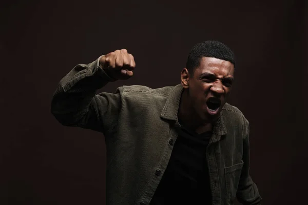 Young Black Man Screaming While Making Winner Gesture Isolated Brown — Stockfoto